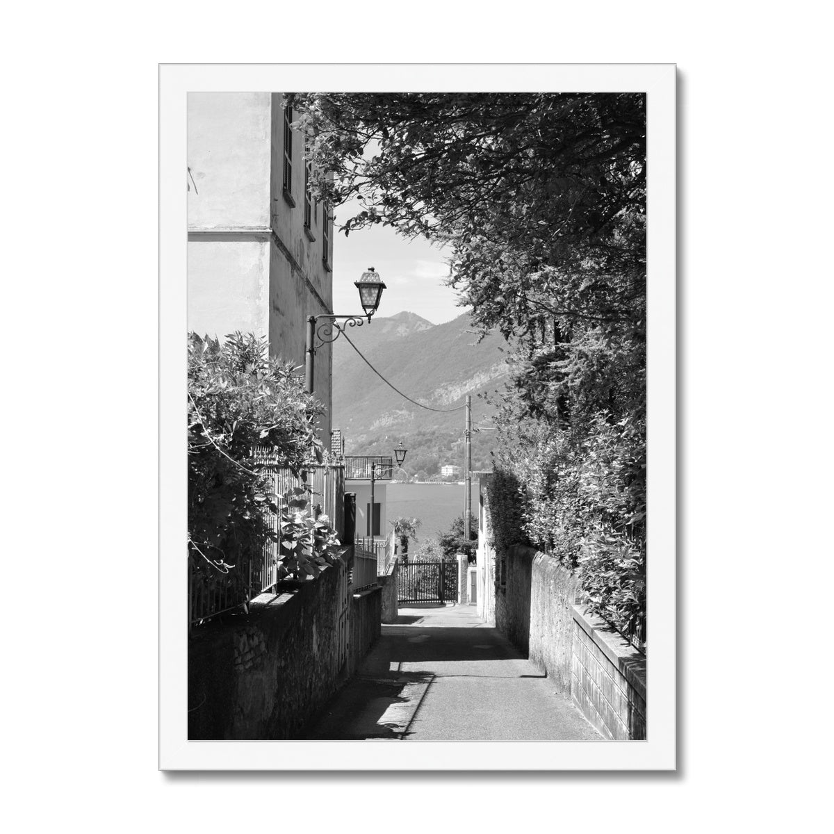 Streets: A Narrow Path Framed Print